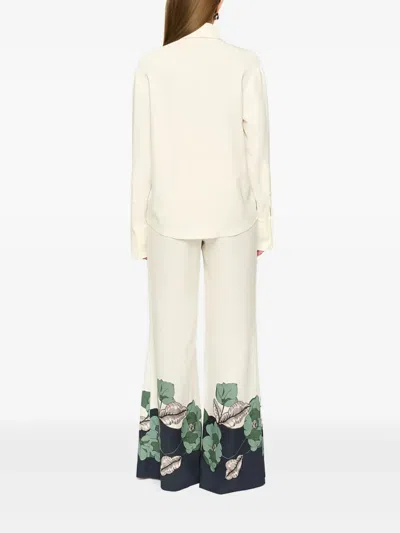 Clea Este Floral Trousers In Neutral