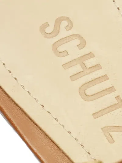 Schutz Ativ Bold V Buckled Studded Mules In Neutral