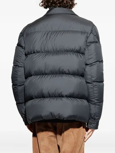 Moncler Pres Buttoned Padded Jacket In Black