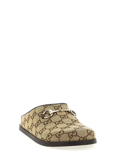 Gucci Gg Monogram Horsebit Flat Mules In Brown