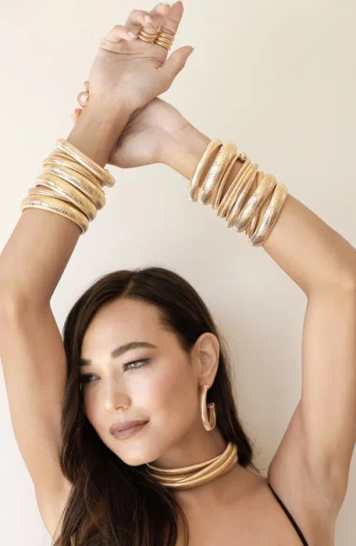 Ettika Set Of 3 Two Tone Stretch Cuff Bracelets In Gold