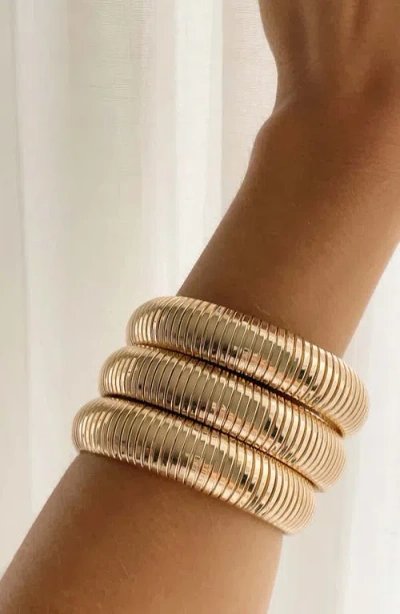 Ettika Set Of 3 Two Tone Stretch Cuff Bracelets In Gold