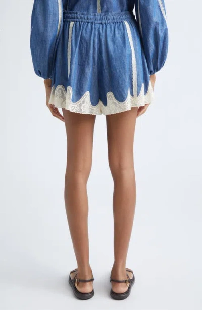 Zimmermann Awaken Lace-trimmed Denim Shorts In Blue