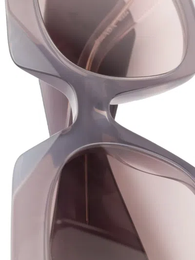 Prada Symbole Sunglasses In Gray