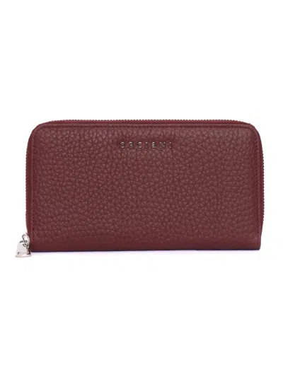Claudio Orciani Rectangular Zip-around Wallet In Textured Calf Leather In Burgundy