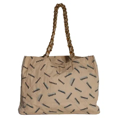 Pre-owned Chanel Logo-print Quilted Chain Tote Bag In Cream Canvas In Black