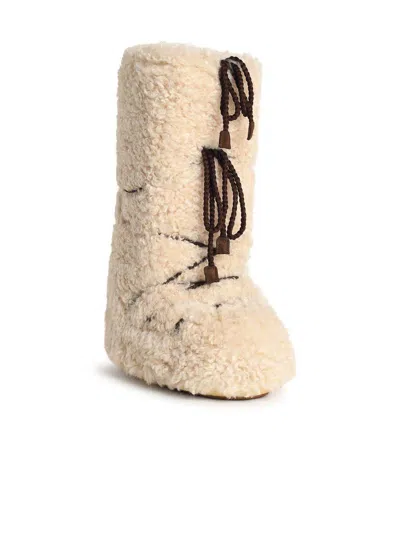 Moon Boot Logo Embellished Mid-calf Flat Sole Boots In Neutral