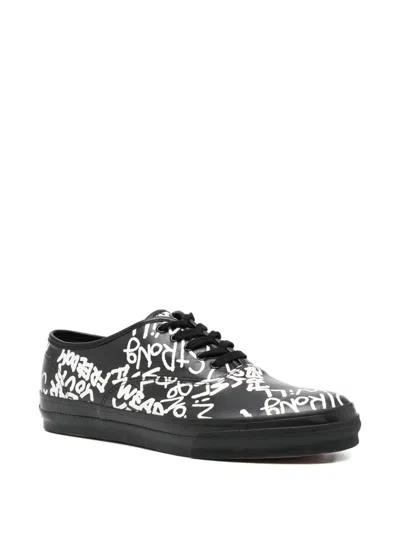 Comme Des Garçons Message Printed Leather Vulcanized Sneakers In Black