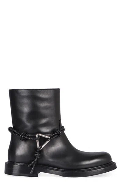 Bottega Veneta Women Black Ankle Boots With Metallic Detail On The Side And Applied Laces In Leather In Animal Print
