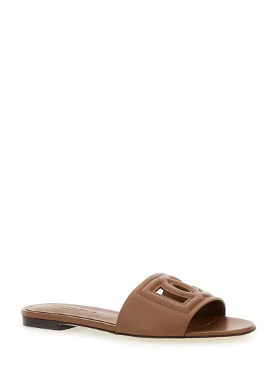 Dolce & Gabbana Leather Slides With Cut-out Logo In Brown