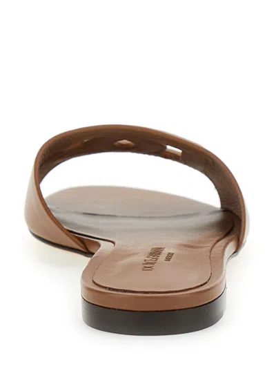 Dolce & Gabbana Leather Slides With Cut-out Logo In Brown