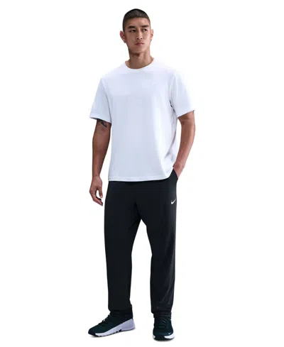 Nike Men's Totality Dri-fit Open Hem Versatile Pants In Black