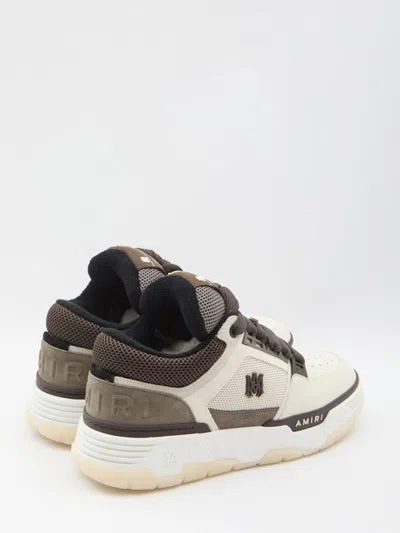 Amiri Brown Low Top Sneakers With Logo Detail On The Side And Mesh Panels In Brown