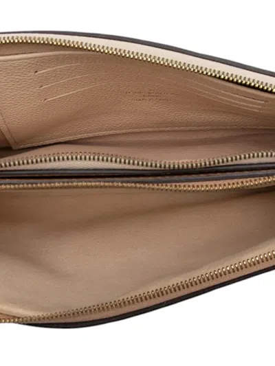 Pre-owned Louis Vuitton 2018 Monogram Empreinte Double Zip Pochette Crossbody Bag In Brown