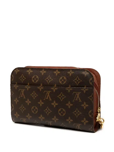 Pre-owned Louis Vuitton 2010 Monogram Orsay Clutch Bag In Brown