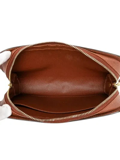 Pre-owned Louis Vuitton 2010 Monogram Orsay Clutch Bag In Brown