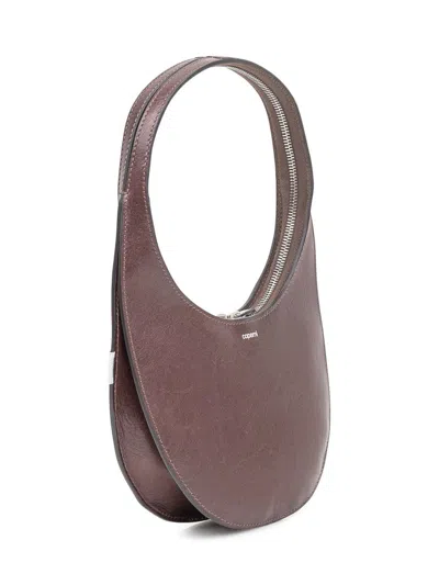 Coperni Small Curved Shoulder Bag Top Handle In Brown