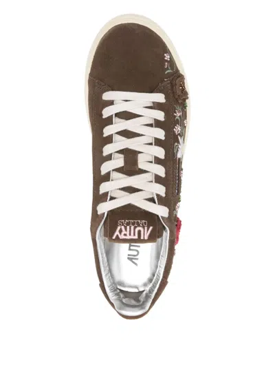 Autry Low-top Sneakers With Floral Embroidery In Rich Brown In Brown
