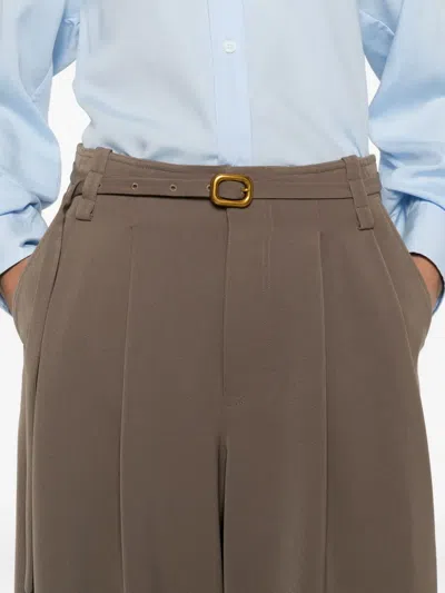 Isabelle Blanche Belted Pleated Trousers In Brown