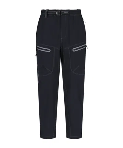 And Wander Streamlined Black Trousers With Zippered Pockets In Blue
