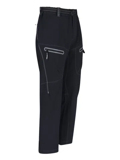 And Wander Streamlined Black Trousers With Zippered Pockets In Blue