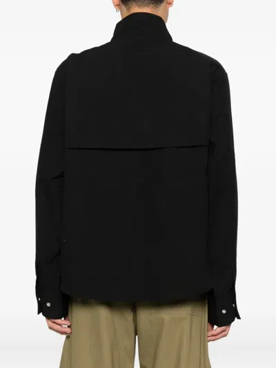 Studio Nicholson Elasticated-waist Multi-pocket Jacket In Black