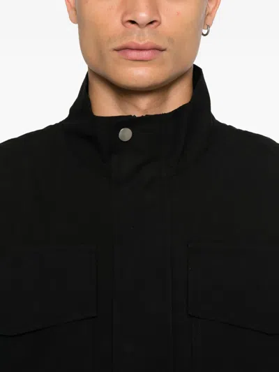 Studio Nicholson Elasticated-waist Multi-pocket Jacket In Black