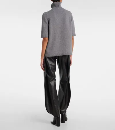 Alaïa High-rise Leather Barrel-leg Pants In Black