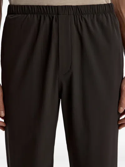 12 Storeez Tech-shell Trousers In Black