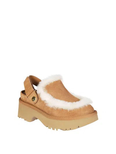 Ugg Suede Mules With Plush Trim And Adjustable Strap In Nude