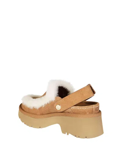 Ugg Suede Mules With Plush Trim And Adjustable Strap In Nude