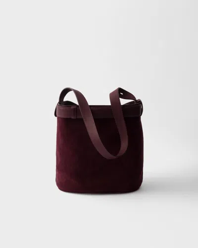Prada Buckle Belted Suede Bucket Bag In Burgundy