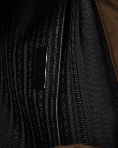 Prada Front-pockets Backpack In Brown