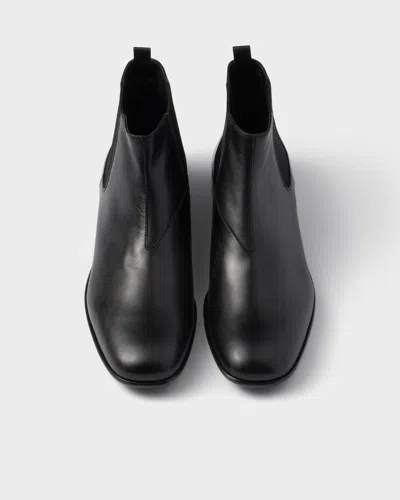 Prada Leather Boots With Logo Print In Multi