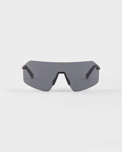 Prada Linea Rossa Metal-frame Sunglasses In Gray