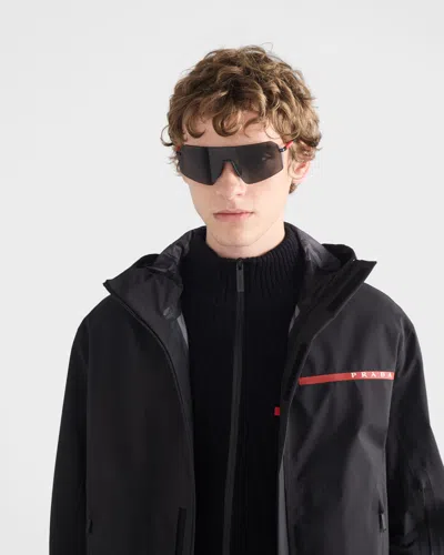 Prada Linea Rossa Metal-frame Sunglasses In Gray