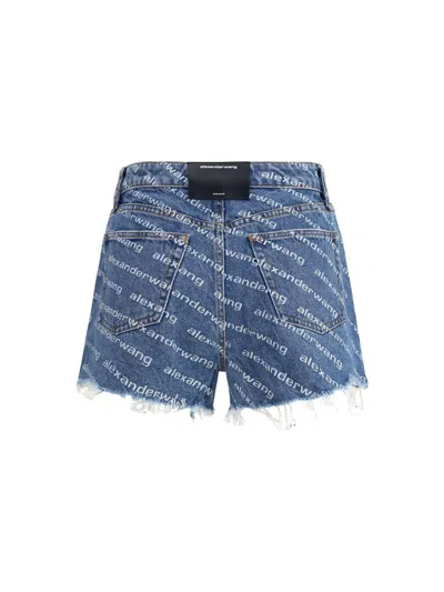 Alexander Wang All-over Logo Printed Denim Shorts In Blue
