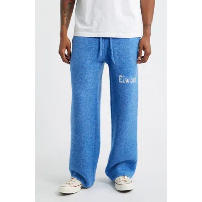 Elwood Intarsia Logo Baggy Sweatpants In Blue