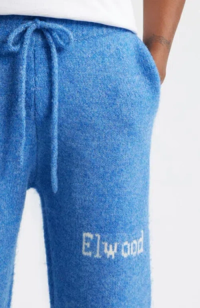 Elwood Intarsia Logo Baggy Sweatpants In Blue