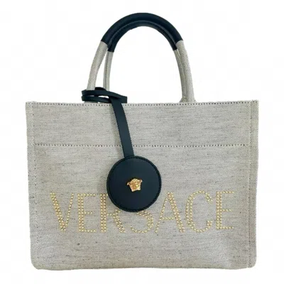 Versace Women's Canvas Studded Logo Mini Tote Bag In Ecru In Pattern