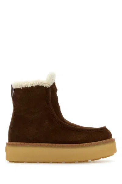 Prada Suede Shearling Platform Boots In Brown
