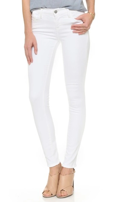 J Brand 811 Mid Rise Skinny Jeans In Blanc