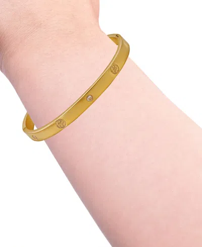 Guess Cubic Zirconia Gold And Silver-tone Side Hinge Bangle Bracelet In Gold