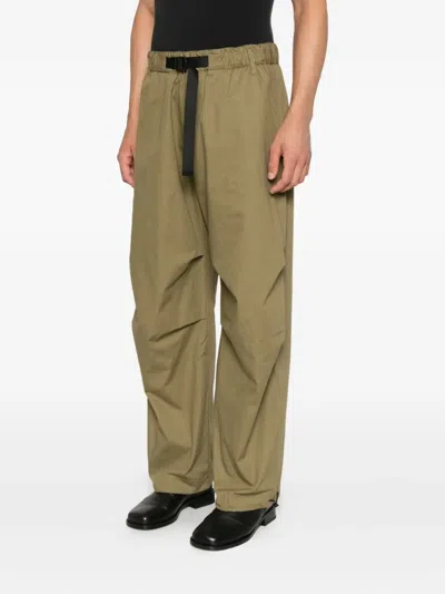 Studio Nicholson Belted Trousers In Green