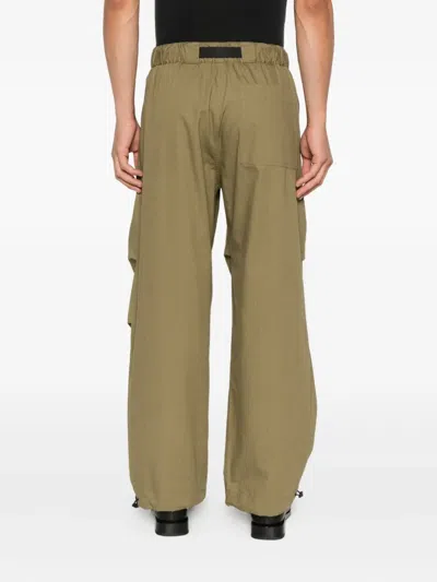 Studio Nicholson Belted Trousers In Green