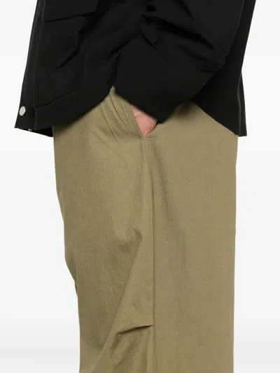 Studio Nicholson Belted Trousers In Green