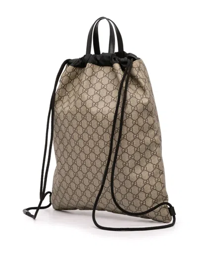 Pre-owned Gucci 2016-2025 Gg Supreme Angry Cat Drawstring Backpack In Brown