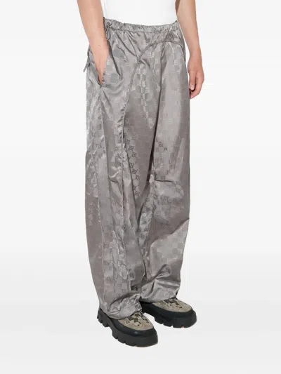 Misbhv Monogram-patterned Trousers In Gray