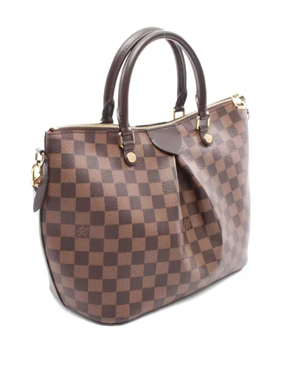Pre-owned Louis Vuitton 2016 Damier Ebene Siena Mm Tote Bag In Brown