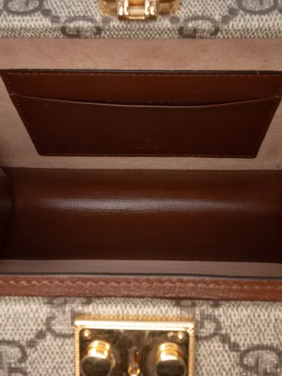 Pre-owned Gucci 2016-2025 Gg Supreme Interlocking G Crossbody Bag In Brown